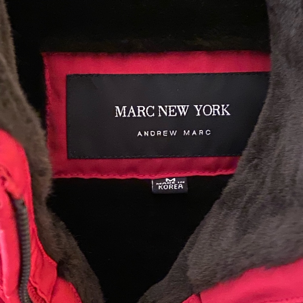 Andrew Marc of New York faux fur quilted red coat with a drawstring.